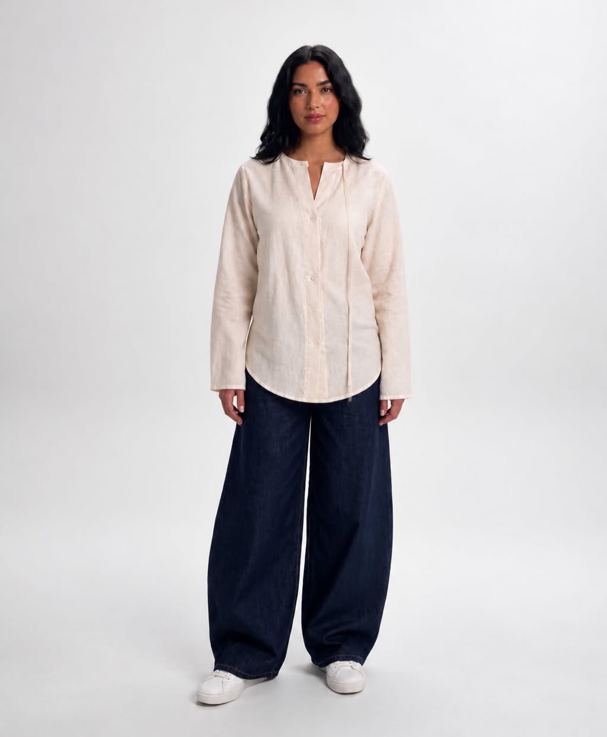 Woman wearing the Ivory Linen Blouse