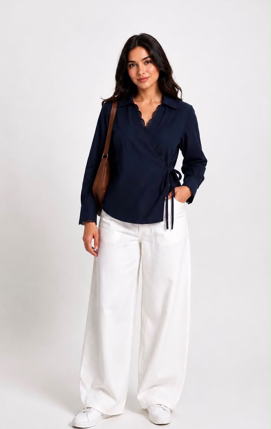 Navy wrap linen blouse styled with white wide-leg trousers